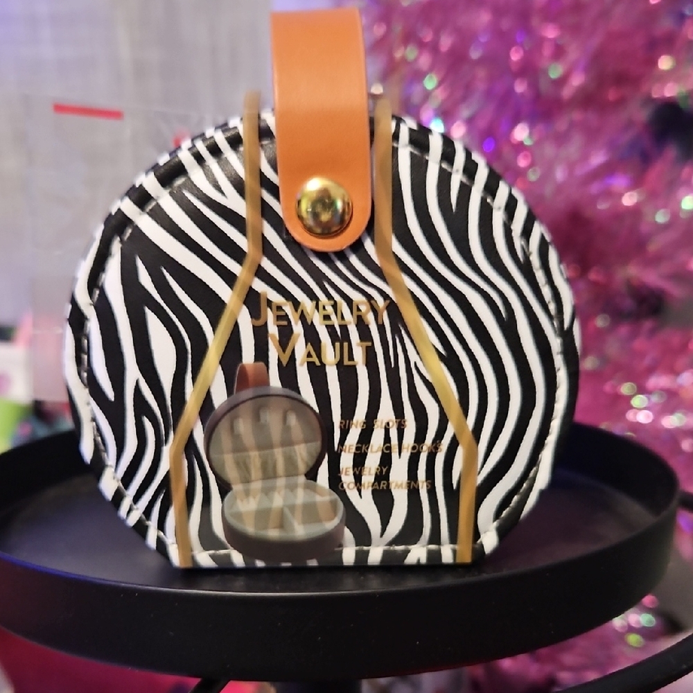 Zebra Print Round Jewelry Case with Tan Strap